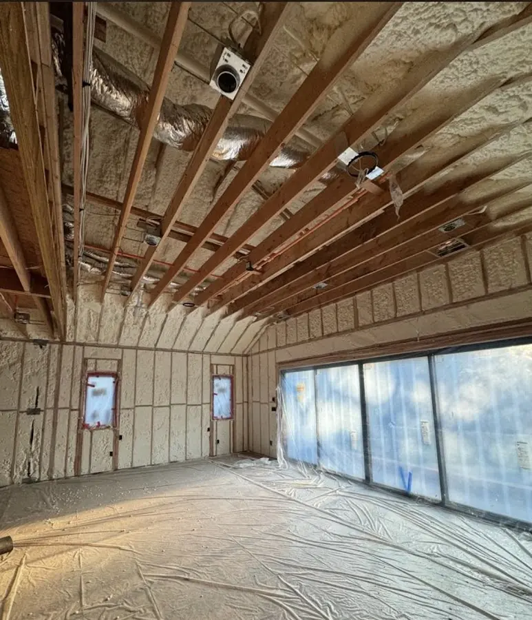 Interior walls and ceiling insulated with spray foam during new construction in Fort Madison