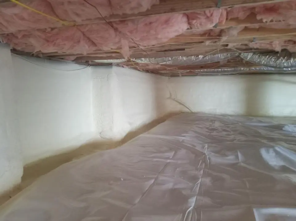 Crawl space encapsulation with closed-cell spray foam for Commercial Roof Restoration in Fort Madison